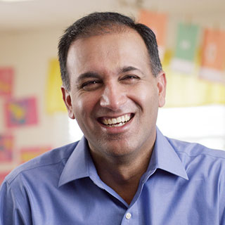 Smiling Goddard School childcare franchise owner 